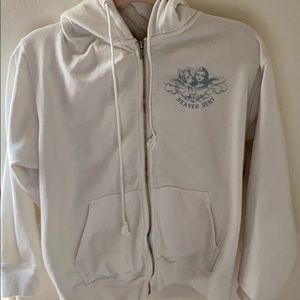 white zip up angel sweater. brandy melville